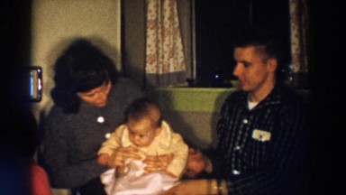 1958: Mother and Baby Sitting and Playing Aliquippa, Pennsylvania