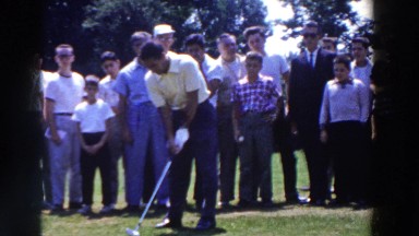 1961: A Man Playing Golf with People Watching Where the Ball Went