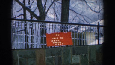 1962: A Frozen Winter Rail with a Weathered Sign in Greece