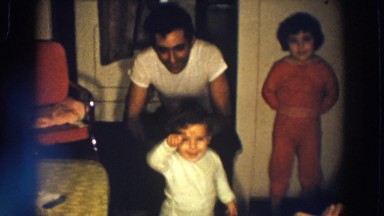 1958: children jumping for joy at family gathering. ALIQUIPPA, PENNSYLVANIA