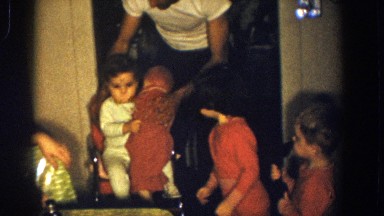 1958: Children Playing With Baby Doll in Aliquippa, Pennsylvania