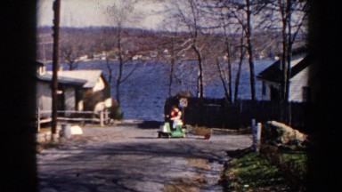 1964: Family Playing With Son On Toy Train In Pequot Lakes