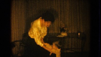 1964: people having fun in a room and smiling with each other to show happiness