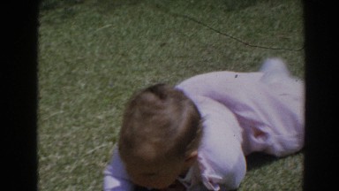1964: little baby crawling outside. NORTH HOLLYWOOD, CALIFORNIA
