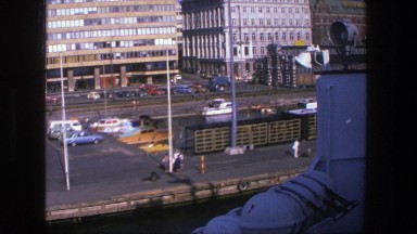1975: boat docking at harbor, boat anchoring in town, captain finding a place