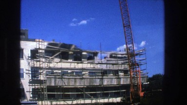 1975: view of a large ship parked outside. STOCKHOLM