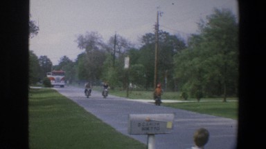 1973: men riding motorcycle down the road WALT DISNEY WORLD FLORIDA