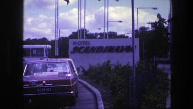 1975: Waiting in Traffic Behind a Taxi to Enter a Large Hotel Parking Lot