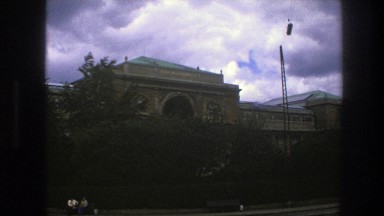 1975: People Sitting Outside Large Building Copenhagen