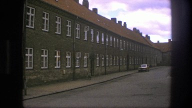 1975: A Long Stretch of Building and Asphalt Road in Copenhagen, Denmark