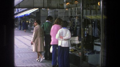 1975: a few people waiting at the counter of a shop COPENHAGEN