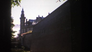 1975: trees on the outside of a building with windows and is tall COPENHAGEN