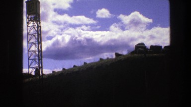 1975: a water tower standing tall over a hill COPENHAGEN
