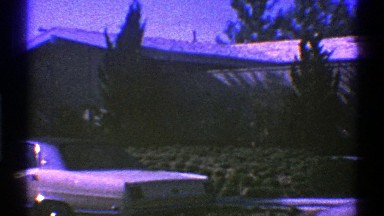 1969: parked car in front of a home. NEVADA