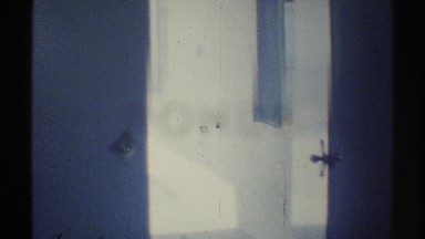 1969: video of the inside of a house with woman sitting on porch WOODLAND HILLS