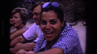 1969: a woman who is smiling and drinking outside UTAH
