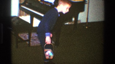 1969: a boy hunting for easter eggs CLARENDON HILLS ILLINOIS