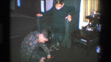 1968: two brothers taping their hockey stick TOLEDO OHIO