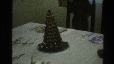 1968: small christmas tree sitting on a dinner table. TOLEDO OHIO