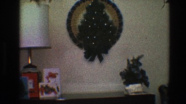 1968: buffet table decoration for christmas with close up view of a wreath
