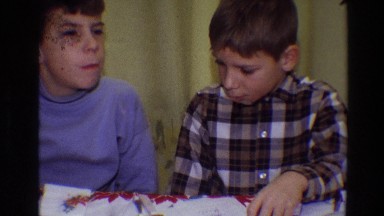 1968: two boys make faces while seated at a table next to each other TOLEDO OHIO