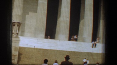 1961: a group of people walking up a set of stairs outside WASHINGTON DC