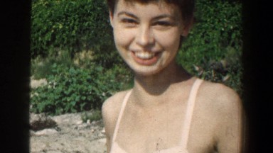 1961: girl in swimsuit smiles at camera BALTIMORE MARYLAND