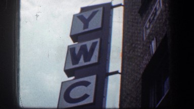 1961: large sign out on a building in a city. BALTIMORE MARYLAND