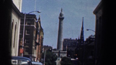 1961: in the city, we see a statue in the distance. WASHINGTON DC