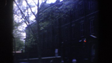 1962: corner of a grand, brick building on a one-way street PHILADELPHIA