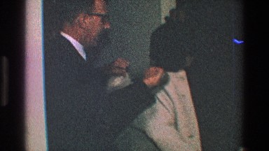 1968: an elderly couple getting ready to step out TOLEDO OHIO