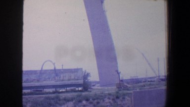 1964: the beginning of constructing an arch and view of the front of a building