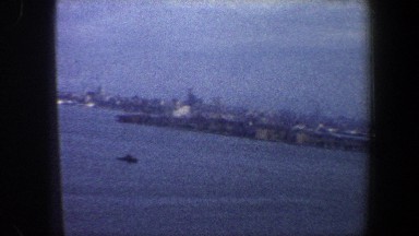 1960: view of water out airplane window NEW YORK CITY