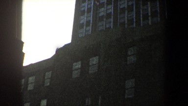 1960: a huge skyscraper up in the blue clear sky with many floors NEW YORK CITY