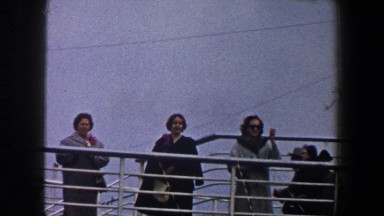 1960: group of people are getting ready for another chance in life, boat