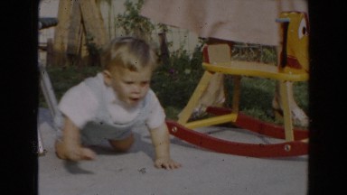 1962: a baby that is crawler on the sidewalk during the day time GLENDALE