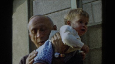 1962: grandfather playing with his little grandson. GLENDALE, CALIFORNIA