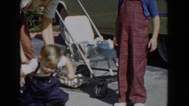 1962: little baby with blonde hair is crawling on the ground GLENDALE
