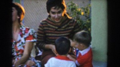 1962: children wanting to play the game themselves. GLENDALE, CALIFORNIA