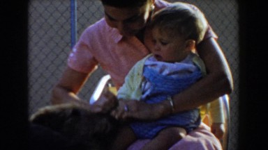 1962: i saw a lady with a baby play . GLENDALE, CALIFORNIA