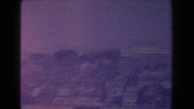 1960: blurry view of small village.