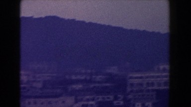 1960: a panorama of a city skyline during the evening