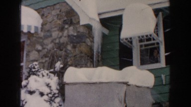 1961: the veranda of house with cute windows on a winter day DEARBORN, MICHIGAN