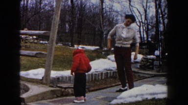 1961: woman playing with her son. DEARBORN, MICHIGAN