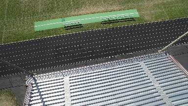 overhead camera panning over seating and field of football stadium. COLORADO