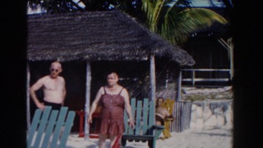 1961: Couple Enjoys Beach Vacation at Nassau Resort