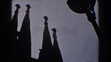 1959: A Building with Pointed Tips and a Bare Tree in Barcelona Spain