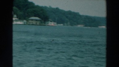 1964: overview of a large body of water, preferably a lake. LAKE WINNEBAGO