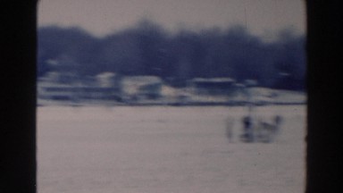 1964: People Walking Across Snow-Covered Frozen Lake in Tustin Wisconsin