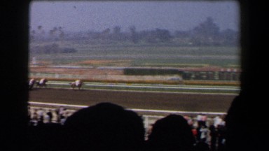 1958: a terrific horse race progressing before a massive spectators CALIFORNIA